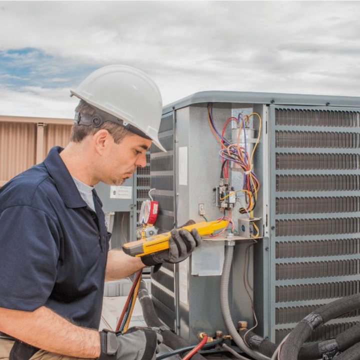 Bayfield Heating & Cooling HVAC technician on a service call in Bayfield, Ontario